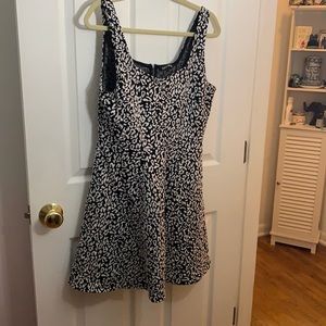 Black and white leopard mini dress with a zipper in the back